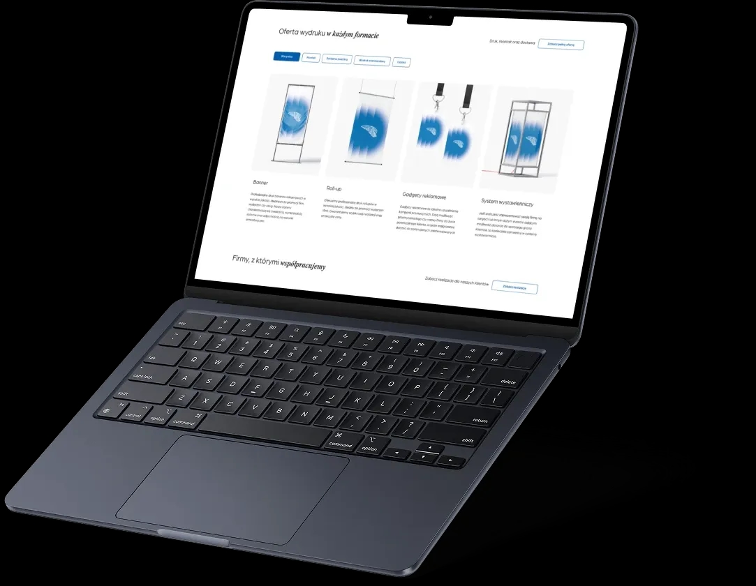 Otwarty laptop prezentujący na ekranie sekcję oferty wydruków na stronie internetowej przedsiębiorstwa Hermes Group.