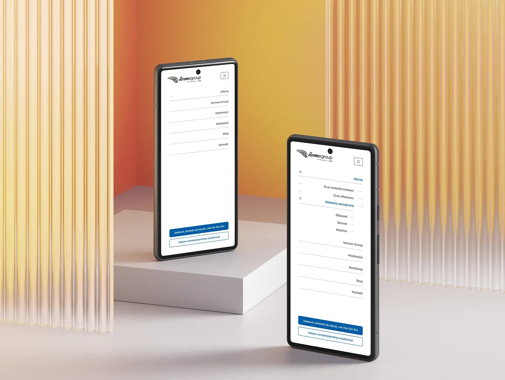 Dwa smartfony pokazujące menu nawigacyjne strony Hermes Group na nowoczesnym tle z ryflowanym szkłem.